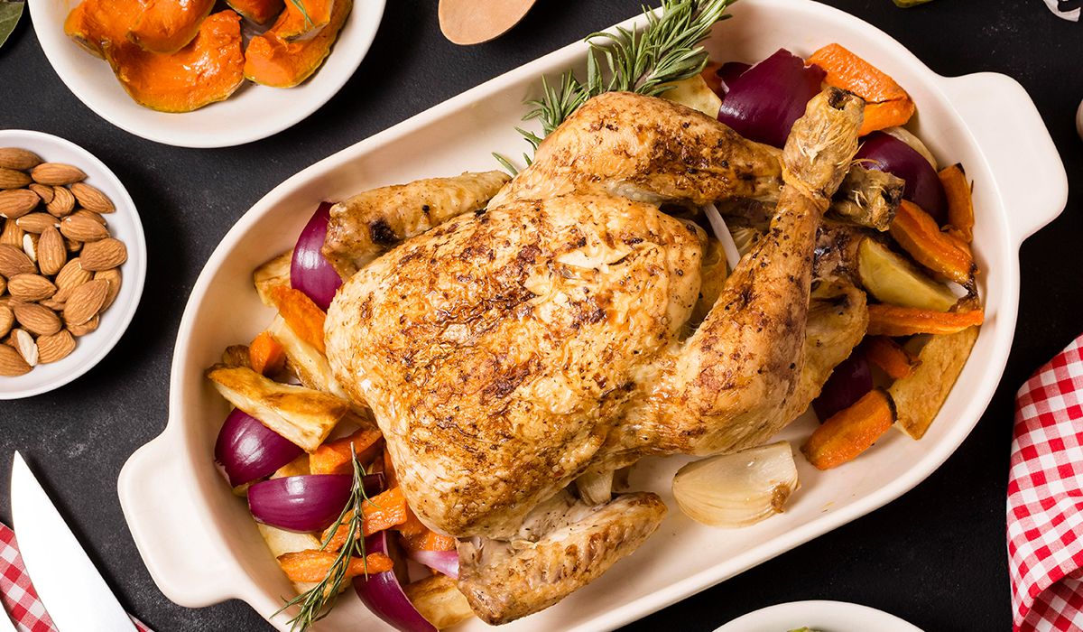 flat-lay-thanksgiving-table-with-roasted-chicken-dish